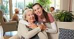 Hug, nurse and portrait with senior woman in retirement home for assisted living or healthcare. Female person, caregiver or smile with patient for elderly care, support or trust in nursing house