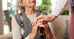 Senior, nurse or hands with cane in retirement home for comfort, support or healthcare. Caregiver, female person or empathy with walking stick for assisted living, elderly care or wellness in house
