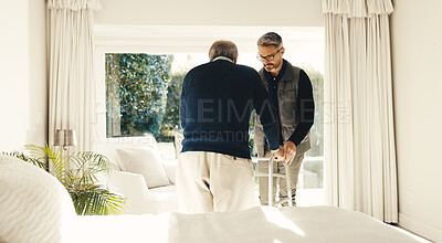 Buy stock photo Caregiver, walker and help with old man in home for walking aide, rehabilitation and Parkinson support. Medical therapist, recovery and elderly care with person with a disability in house for balance