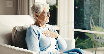 Buy stock photo Old woman, chest pain or sick in home with health risk, thinking or heartburn with retirement. Female person, elderly and view by window, chronic illness and pressure with hypertension or indigestion