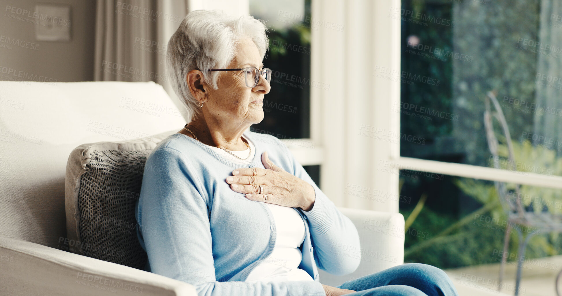 Buy stock photo Old woman, chest pain or sick in home with health risk, thinking or heartburn with retirement. Female person, elderly and view by window, chronic illness and pressure with hypertension or indigestion