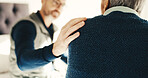 Caregiver, hand and elderly person in bedroom for healthcare, discussion or support in retirement home. People, health worker or senior care with old patient for conversation, recovery or advice