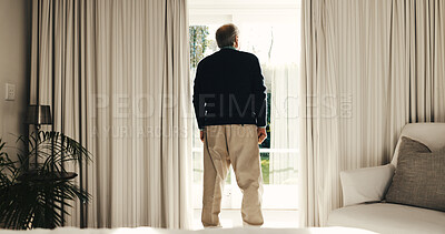 Buy stock photo Thinking, back and senior man by window in home, perspective and ponder in retirement. Reflection, pension and elderly person with memory at apartment, mindset and contemplating decision with view