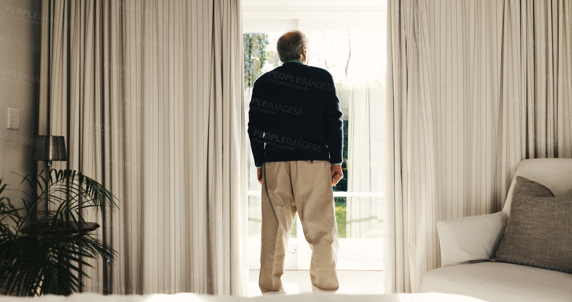 Buy stock photo Thinking, back and senior man by window in home, perspective and ponder in retirement. Reflection, pension and elderly person with memory at apartment, mindset and contemplating decision with view