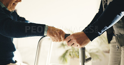Buy stock photo Caregiver, walker and hands with old man in home for walking aide, rehabilitation or Parkinson support. Medical therapist, recovery and elderly care with person with a disability in house for balance