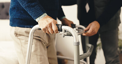 Buy stock photo Senior, hands and walker with physiotherapist for assisted living, balance or support in home. Elderly, man or therapist helping person with a disability for walking aid or assistance in bedroom
