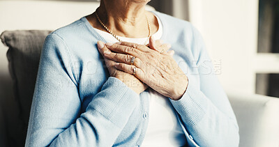 Buy stock photo Senior, woman and hands with chest pain in retirement house for cardiac arrest or hypertension. Elderly, female person or heart attack with discomfort for chronic illness or asthma in old age home