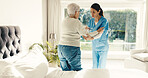 Elderly, woman and nurse with patient in retirement home for assisted living or support in bedroom. Female person, healthcare worker or caregiver with helping hand for walking aid or senior care