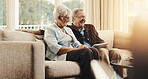 Tablet, laughing and planning with old couple on sofa for account review, check or retirement fund. Pension policy, online budget or insurance payout with senior man and woman in living room in home