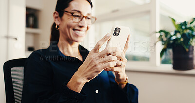 Buy stock photo Texting, smile and woman in home with phone, online communication and post update on social media. Digital, happy and mature person with tech, message notification or chatting on virtual platform.