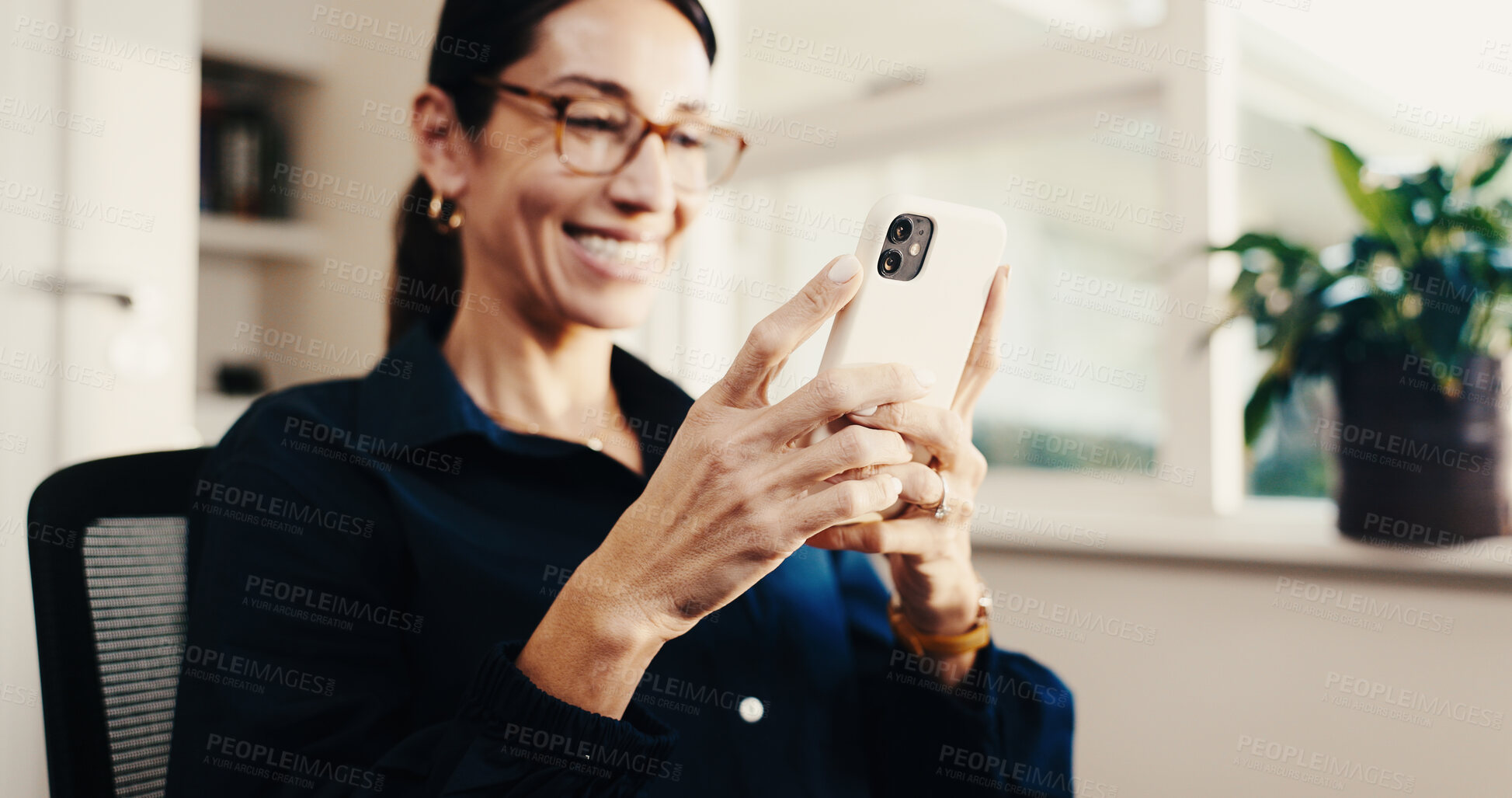 Buy stock photo Texting, smile and woman in home with phone, online communication and post update on social media. Digital, happy and mature person with tech, message notification or chatting on virtual platform.