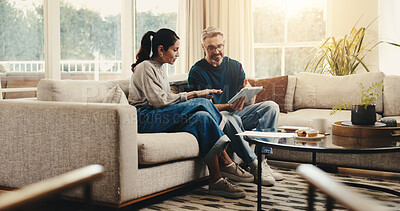 Buy stock photo Tablet, discussion and couple on sofa in home with planning budget, savings or finance research. Relax, digital technology and mature man with woman in living room for conversation for investment.