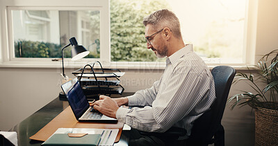 Buy stock photo Budget review, online and businessman with laptop in office, accountant or tax preparation with info. Bookkeeper, typing and mature person with technology, audit and financial report in business