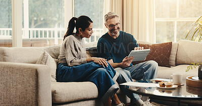 Buy stock photo Tablet, conversation and couple on sofa in home with planning budget, savings or finance research. Relax, digital technology and mature man with woman in living room for discussion for investment.