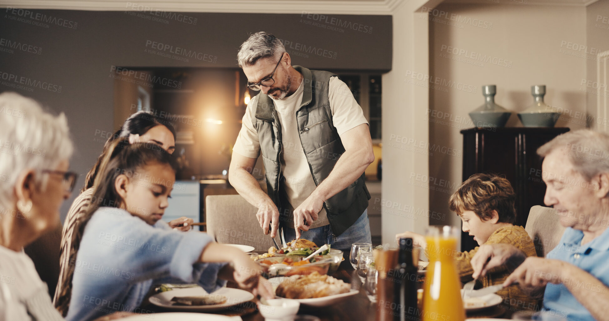 Buy stock photo Cooking, serving and big family in dining room for dinner, prepare food and bonding together in home. Culinary skills, generations and happy people for supper, conversation and thanksgiving feast