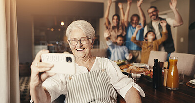 Buy stock photo Grandmother, happy and selfie with big family in home, people and dinner party with memory. Post, photography and picture with old woman, cheering and grandpa with parents and kids for meal at house