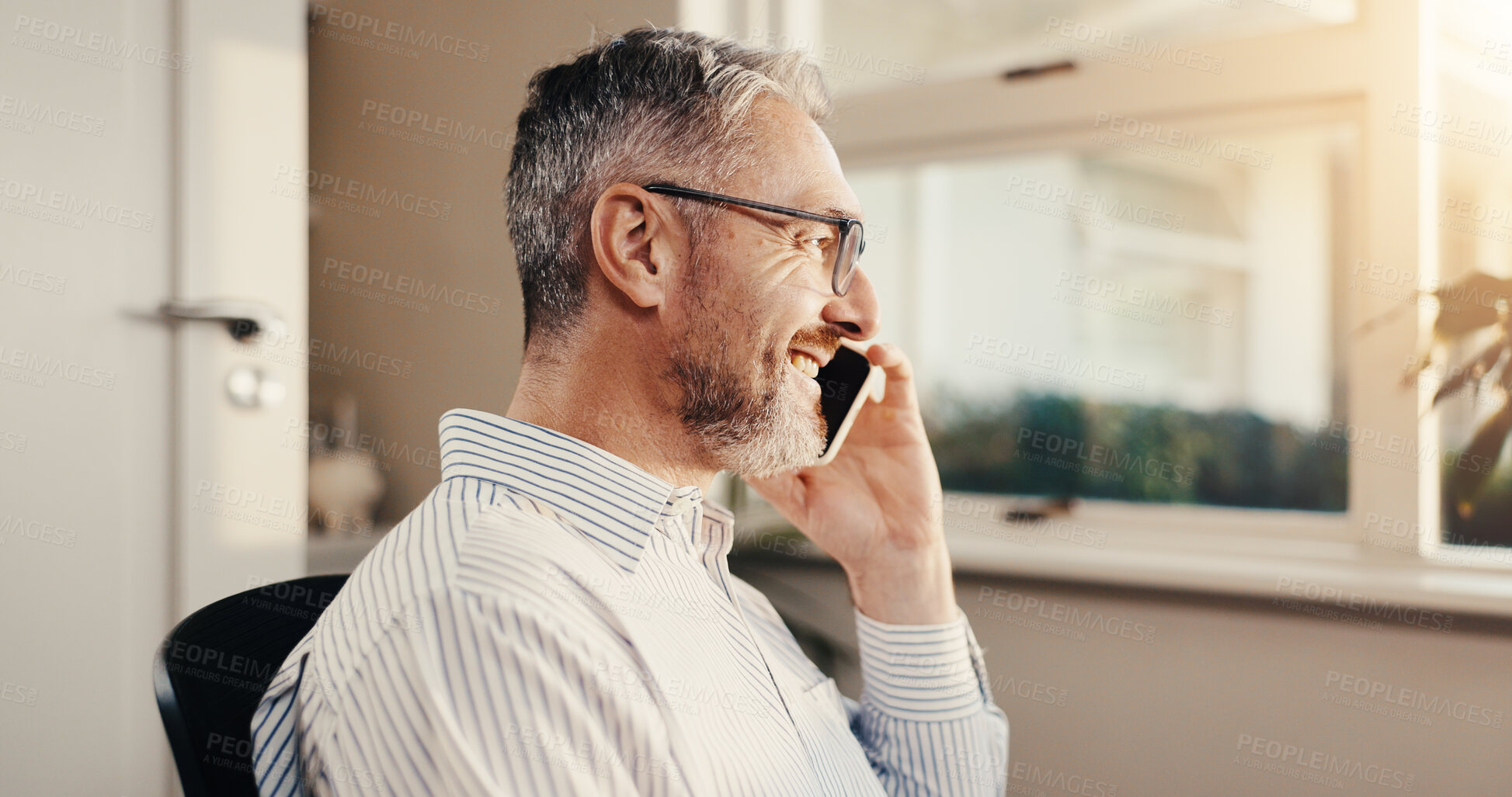 Buy stock photo Phone call, smile and man in office for business negotiation, insurance cover or communication. Mobile, mature person and broker talk to contact at work for premium benefits, policy advice and happy