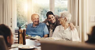 Buy stock photo Love, social gathering and thanksgiving with family hug in dining room together for celebration. Bonding, food and woman with senior parents in apartment for greeting, holidays or support with child