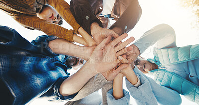 Buy stock photo Below, flare and hand stack with family outdoor together for solidarity, support or unity. Palm, sky and relationship with happy people in circle for bonding, connection or security in summer