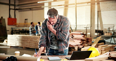 Buy stock photo Carpenter, phone call and man in workshop for writing notes, production schedule and planning. Construction, contractor and person on cellphone for contact, project update and talking for renovation