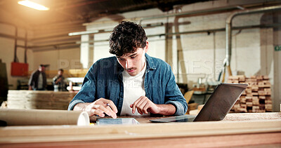 Buy stock photo Carpentry, man and tablet review in workshop for planning custom project, joinery sizing or CAD. Serious, carpenter and tech in warehouse for furniture production, inventory update and material specs