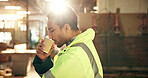 Construction, coffee and man in workshop for break, rest and recharge with caffeine for renovation. Carpentry, contractor and person with drink, beverage and latte for energy, wellness and calm