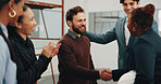 Handshake, meeting and business people in office with contractor for renovation deal or agreement. Applause, discussion and employee shaking hands with construction foreman for workplace remodeling.