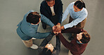 Diversity, team and huddle with hands together for business mission, support or trust in unity. Top view, group or employees piling with stack or union for social cohesion, inclusion or solidarity
