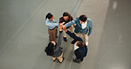 Business, people and meeting with high five for winning celebration, mission or team success. Top view, group or employee with smile or hands together in huddle for unity or solidarity on space