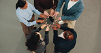 Business, people and meeting with star sign for collaboration, unity or team solidarity. Top view, group or employees with shape, hands or fingers together in huddle for social cohesion or mission