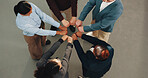 Business, people and meeting with fist bump for collaboration, unity or team solidarity. Top view, group or employees with hands together in huddle or circle for social cohesion, inclusion or mission