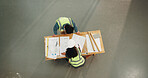 Architect, people or planning with blueprint for construction strategy, ideas or discussion. Top view, man and woman with documents or floor layout for building project or architecture development