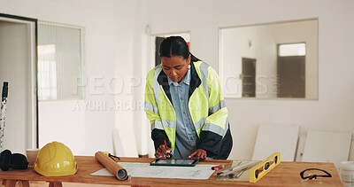Buy stock photo Construction, documents and woman on tablet with blueprint, planning and drawing for building design. Architecture, contractor and person at desk with tech, sketch or remodeling layout for renovation