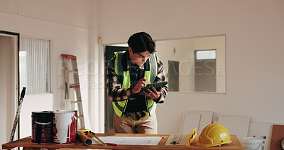 Buy stock photo Architecture, tablet and man in building with blueprint, planning and drawing for structure design. Construction, contractor and person at desk with tech, sketch and remodeling layout for renovation