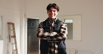 Buy stock photo Arms crossed, construction and project management with architect man in home for building renovation. Creative, interior design and portrait of happy engineer in house for property development