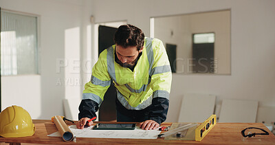 Buy stock photo Construction, tablet and man with blueprint, planning and drawing for building design in office. Architecture, contractor and person at desk with tech, sketch and remodeling layout for renovation