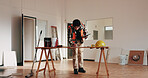 Construction, tablet and man in office with blueprint, planning and drawing for building design. Architecture, contractor and person at desk with tech, writing and remodeling layout for renovation