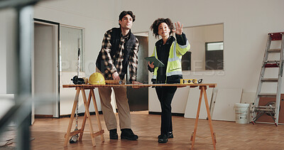 Buy stock photo Architect, planning and talk on site with builder, design advice and tablet for renovation research. People, discussion and remodeling of commercial building with tech, architecture or project update