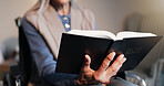 Bible, hands and senior woman in wheelchair at house for religion, worship or spiritual guide. Relax, reading and elderly person with disability in home with studying holy scripture in bedroom.