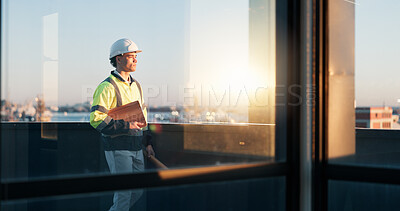 Buy stock photo Man, engineer or reflection on rooftop with clipboard, urban development or view for expansion project. Builder, thinking or checklist at building window for perspective at infrastructure evaluation