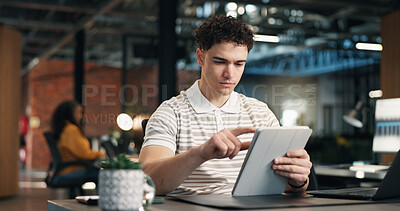 Buy stock photo Creative, scroll and man with tablet in office, serious and planning for article or research on app. Business, blogger and person with technology, reading and editing blog post on web and browsing