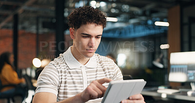 Buy stock photo Creative, editing and man with tablet in office, serious and planning for article and scroll on app. Business, blogger and person with technology, reading and browsing research on website or blog