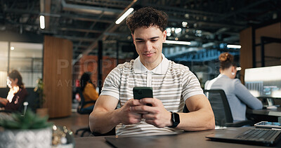Buy stock photo Man, typing and reading in office with phone, software engineer website or search trends for project. App, coworking and person in digital agency with tech, IT news article or text message for work
