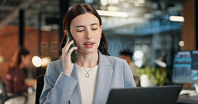 Buy stock photo Laptop, woman and phone call in office for financial analysis, data report and advice at night. Coworking, tech and person talking to contact for investment metrics, communication and overtime