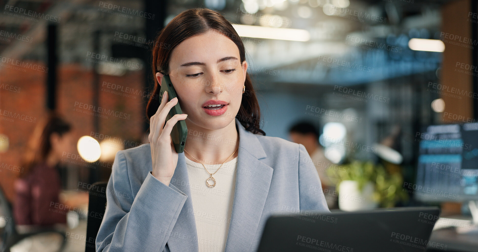 Buy stock photo Laptop, woman and phone call in office for financial analysis, data report and advice at night. Coworking, tech and person talking to contact for investment metrics, communication and overtime