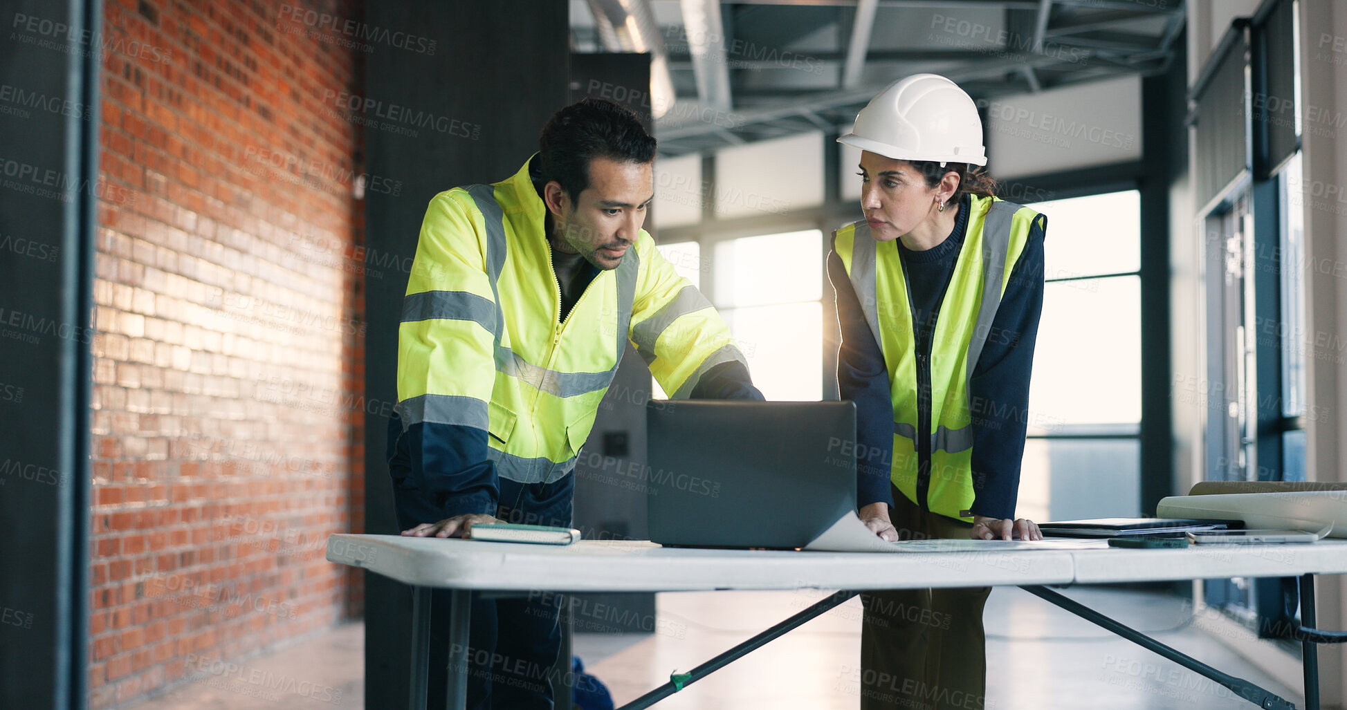 Buy stock photo Architect, team and conversation in building with laptop, review design and discussion for project. People, talk and planning with tech for architecture research, brainstorming and partnership