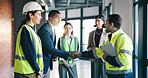 Architect, team and handshake with tablet, review design and discussion for project in building. People, flare and shaking hands with tech for architecture proposal, brainstorming and partnership