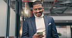 Happy, businessman and good news in office with phone, glasses and notification of property listing. Real estate agent, person and smile in workplace with tech, text message and positive feedback.