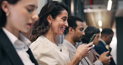 Buy stock photo Seminar, audience and woman with phone for reading info, online notes or digital interaction. Crowd, mature person or happy on mobile at workshop for live poll software, survey response or networking