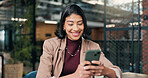 Business, typing and happy woman with phone in office for social media, research or communication. Female person, employee or user with smile on smartphone for online chatting or texting in workplace